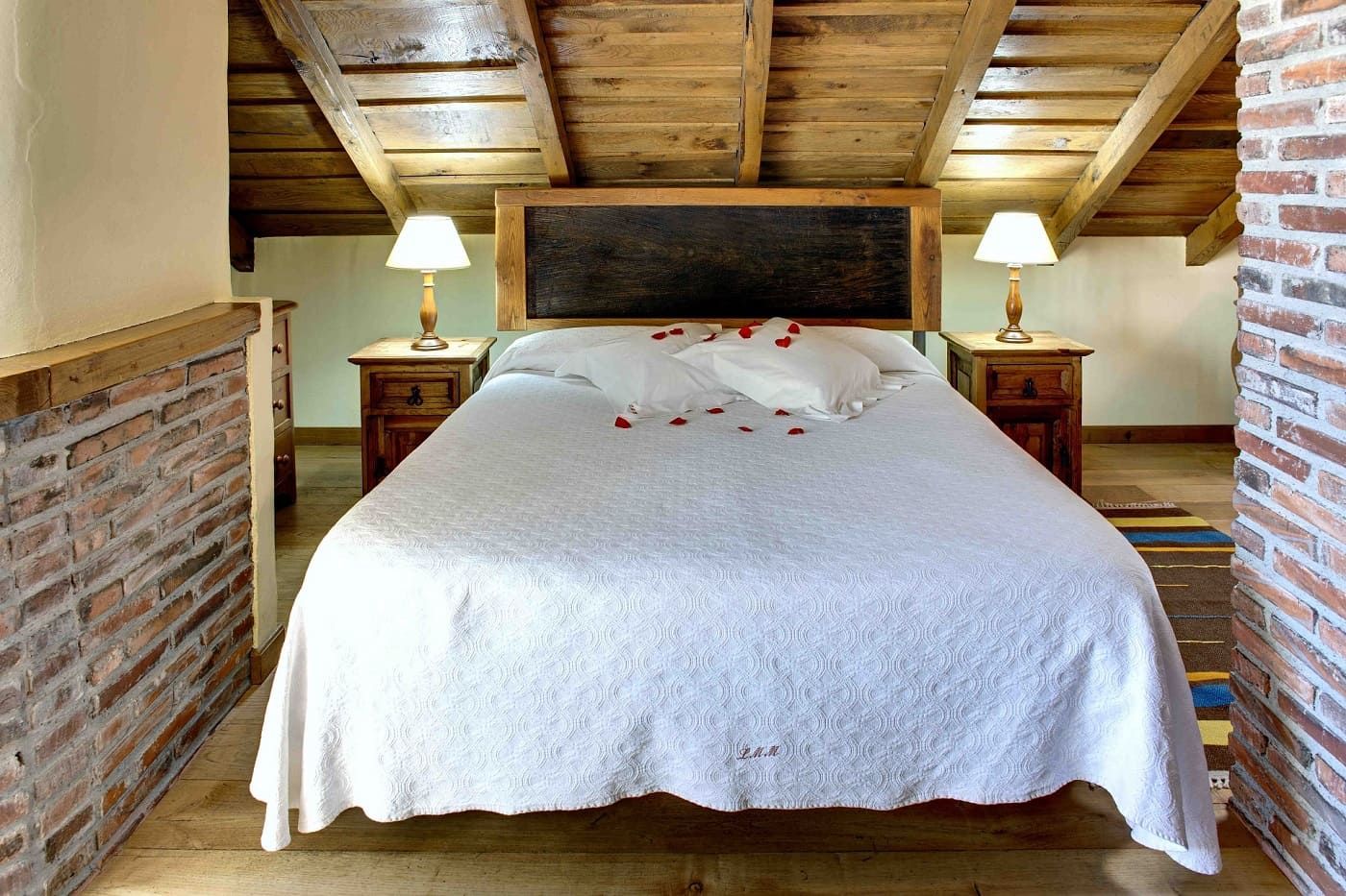 room with a sloping wooden ceiling in llanes asturias