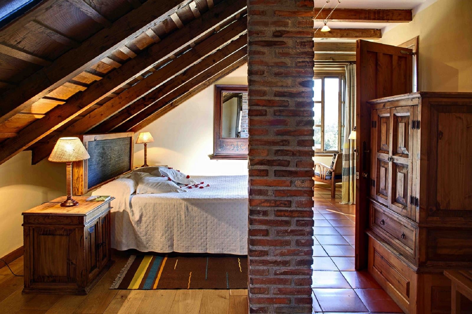 room with wooden beams in the ceiling asturias