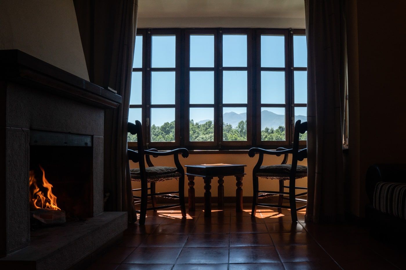 rural hotel with fireplace inside the room of home open in asturias